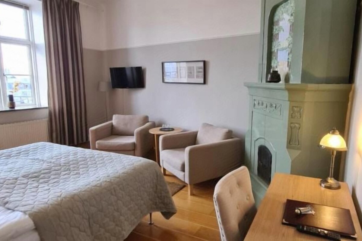 Desk, blackout drapes, iron/ironing board (on request), WiFi (free)