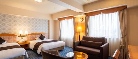 Quarto duplo superior, para não fumantes | Cofres nos quartos, escrivaninha, Wi-Fi de cortesia, roupa de cama