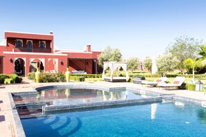2 outdoor pools, pool umbrellas, pool loungers