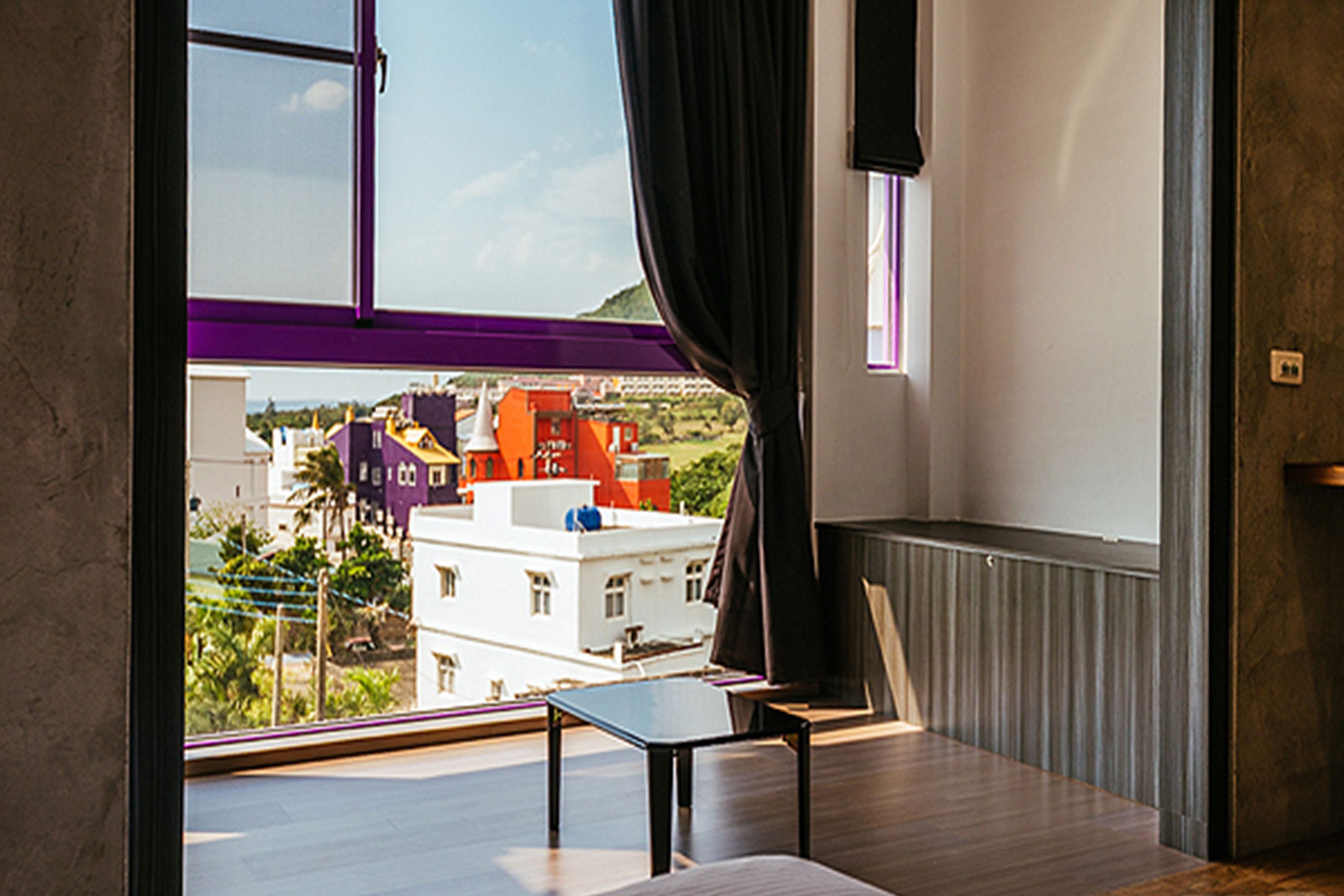 quadruple room, 2 double beds, ocean view | living area | flat-screen tv