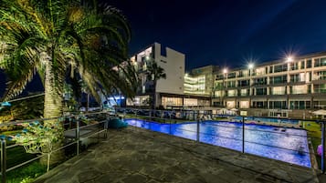 Seasonal outdoor pool, open 10:00 AM to 9:00 PM, sun loungers