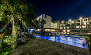 Seasonal outdoor pool, open 10:00 AM to 9:00 PM, sun loungers