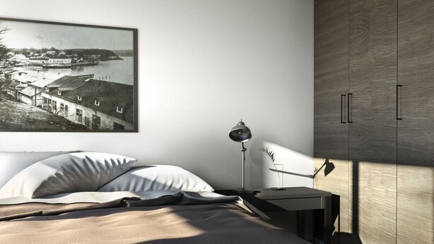 A bedroom with a bed, a nightstand, a desk, a lamp, and a wardrobe. - Naantali City Apartments (Naantali)