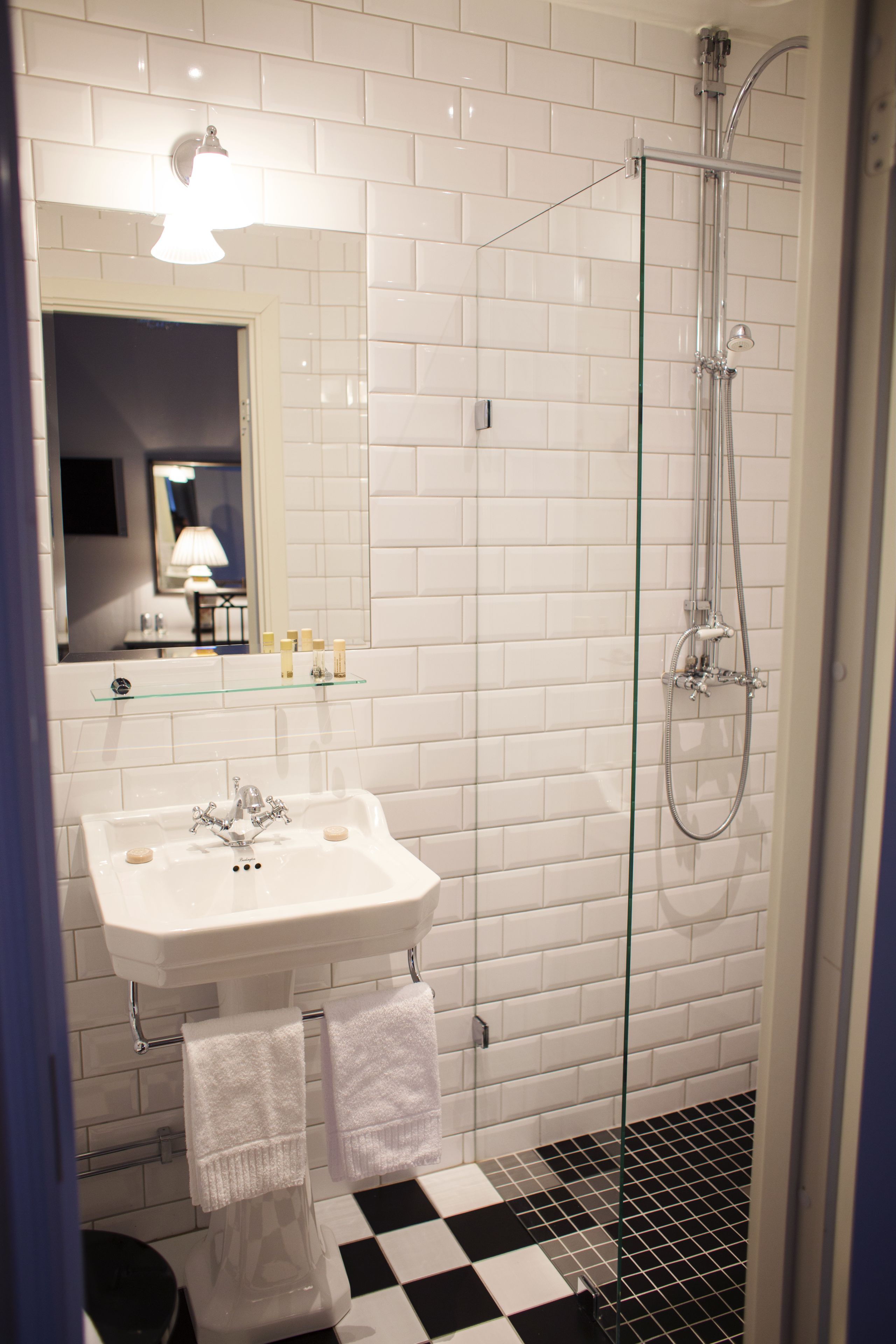 shower, free toiletries, hair dryer, towels