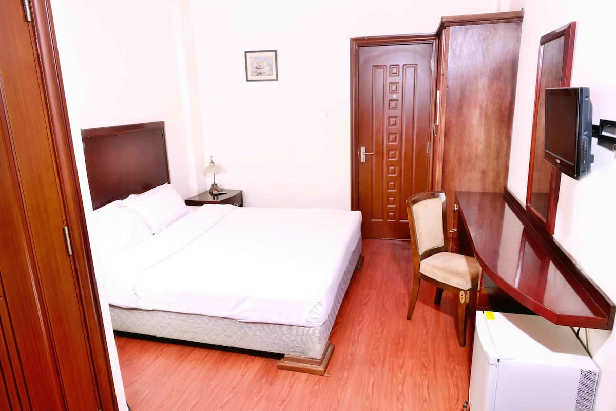 Suite Deluxe, para fumadores, vista a la ciudad | Ropa de cama de alta calidad y minibar
