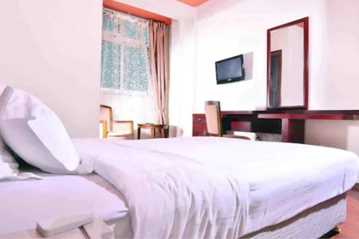 Ropa de cama de alta calidad y minibar