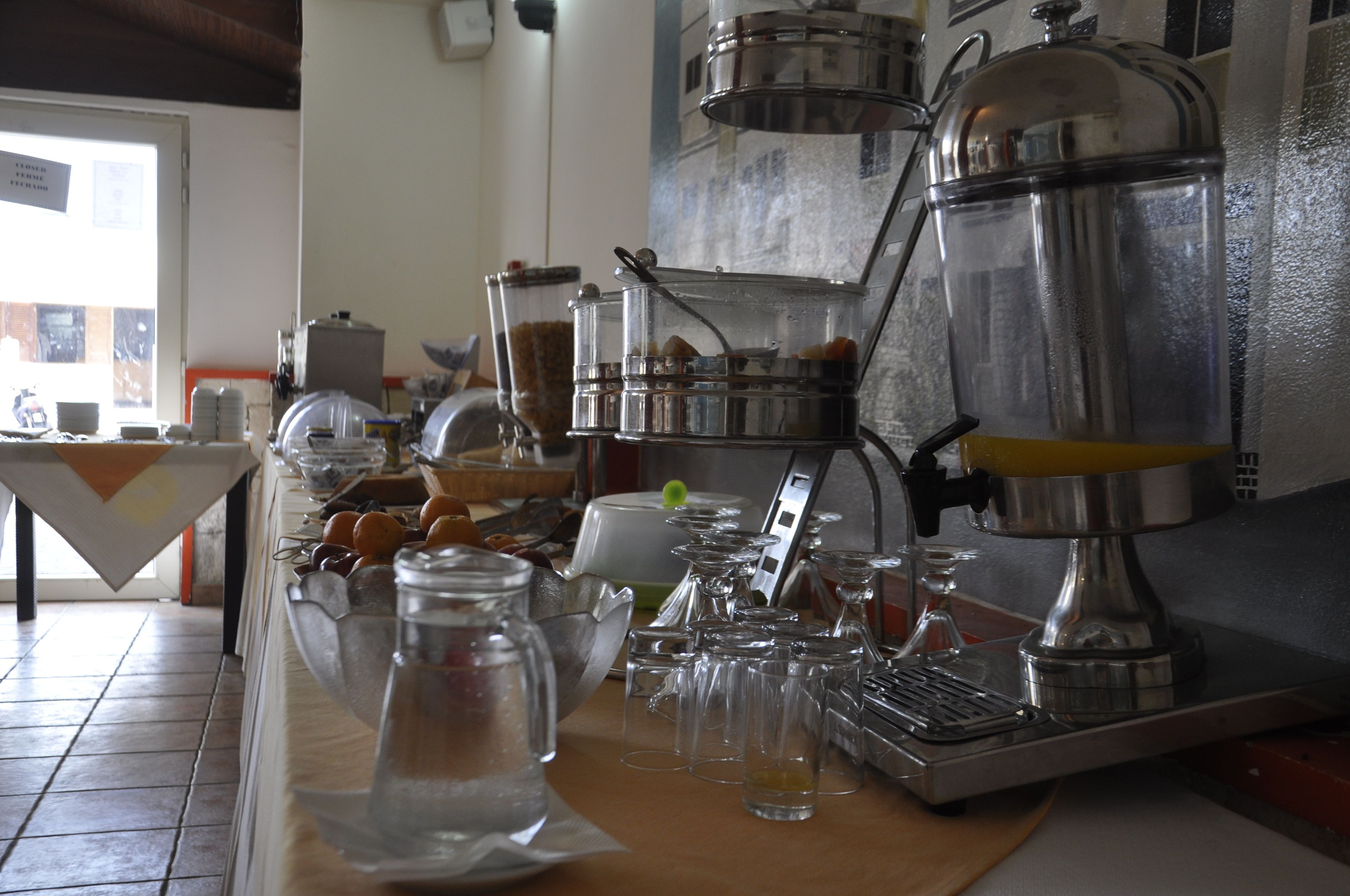 Breakfast, lunch, dinner served; local cuisine 