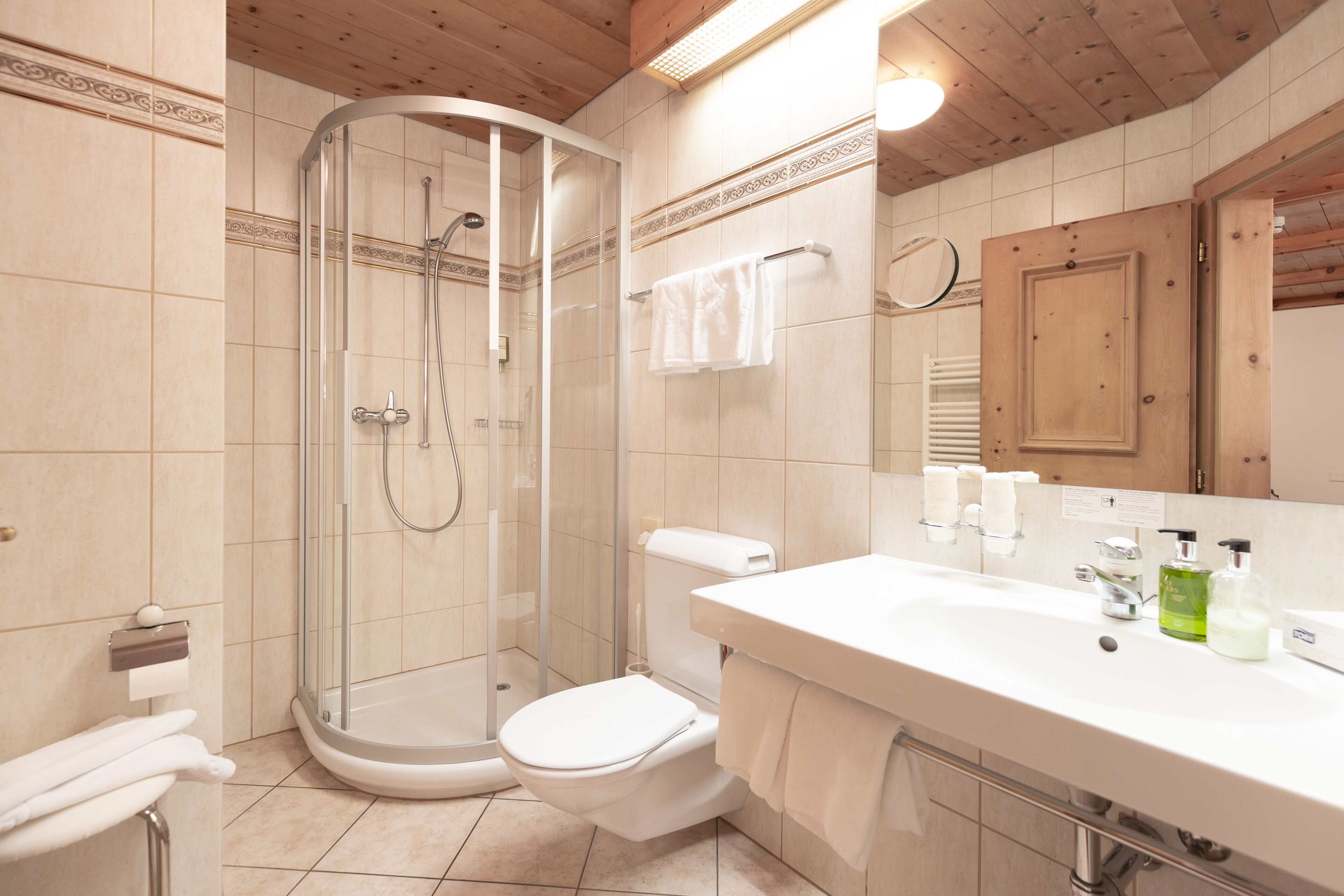 superior double room | bathroom | hair dryer, bathrobes, towels, soap