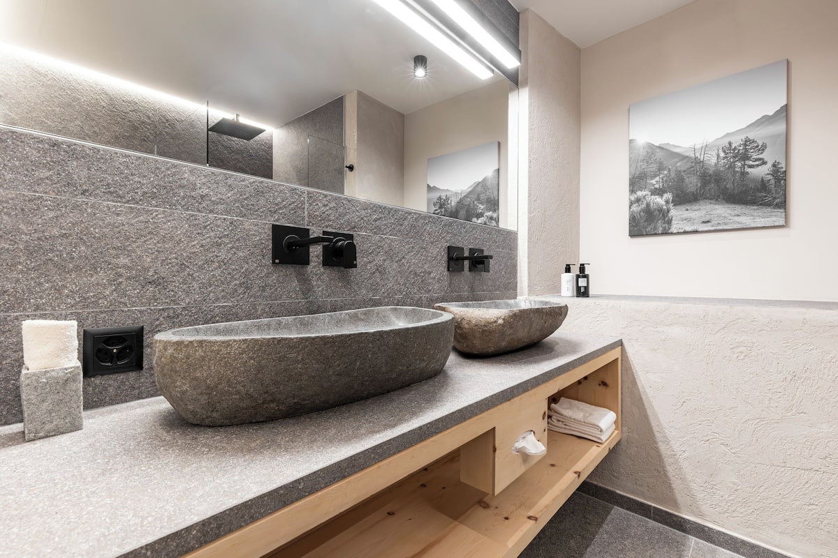 superior double room | bathroom | hair dryer, bathrobes, towels, soap