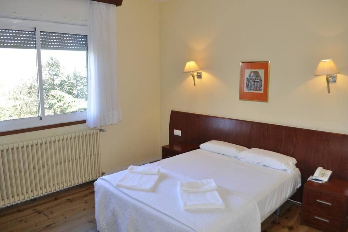 Tweepersoonskamer | Een minibar, een bureau, gratis wifi, beddengoed