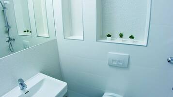 Design Studio Suite, Terrace, Sea View | Bathroom | Shower, free toiletries, hair dryer, towels