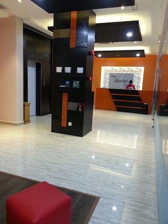 Check-in/check-out kiosk. The Blanket Hotel