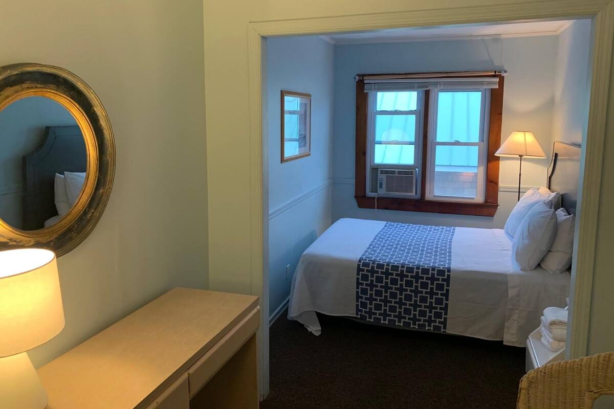 Guestroom Double Full( 1 full bed, Shared Bathroom) | Premium bedding, laptop workspace, iron/ironing board (on request)