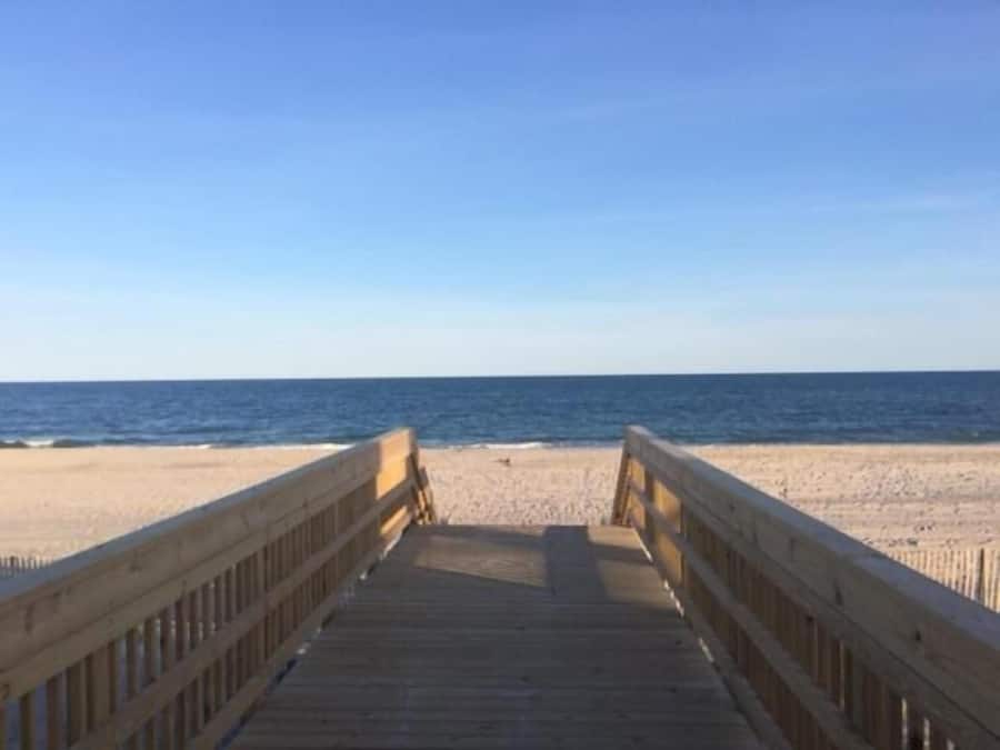 Beach nearby, white sand, sun loungers, beach umbrellas