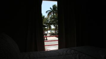 Beach Front Standard Room | In-room safe, desk, iron/ironing board (on request), WiFi (free)