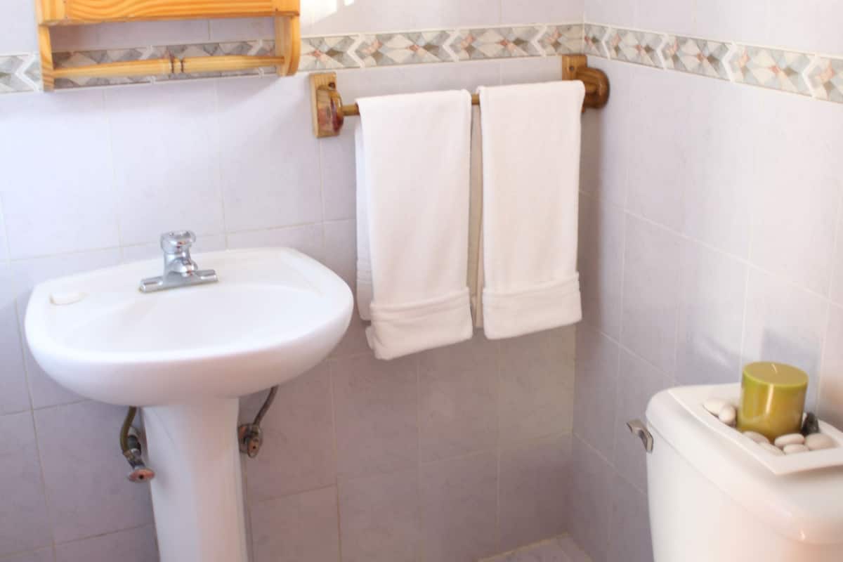 beachside room | bathroom | shower, free toiletries, hair dryer, towels