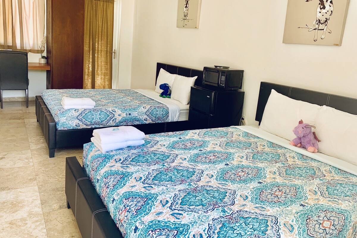 MwPi 101 Pool Walk Out Suite with 1 Full & 1 Queen Size Bed First Floor | Premium bedding, down comforters, WiFi (free), bed sheets