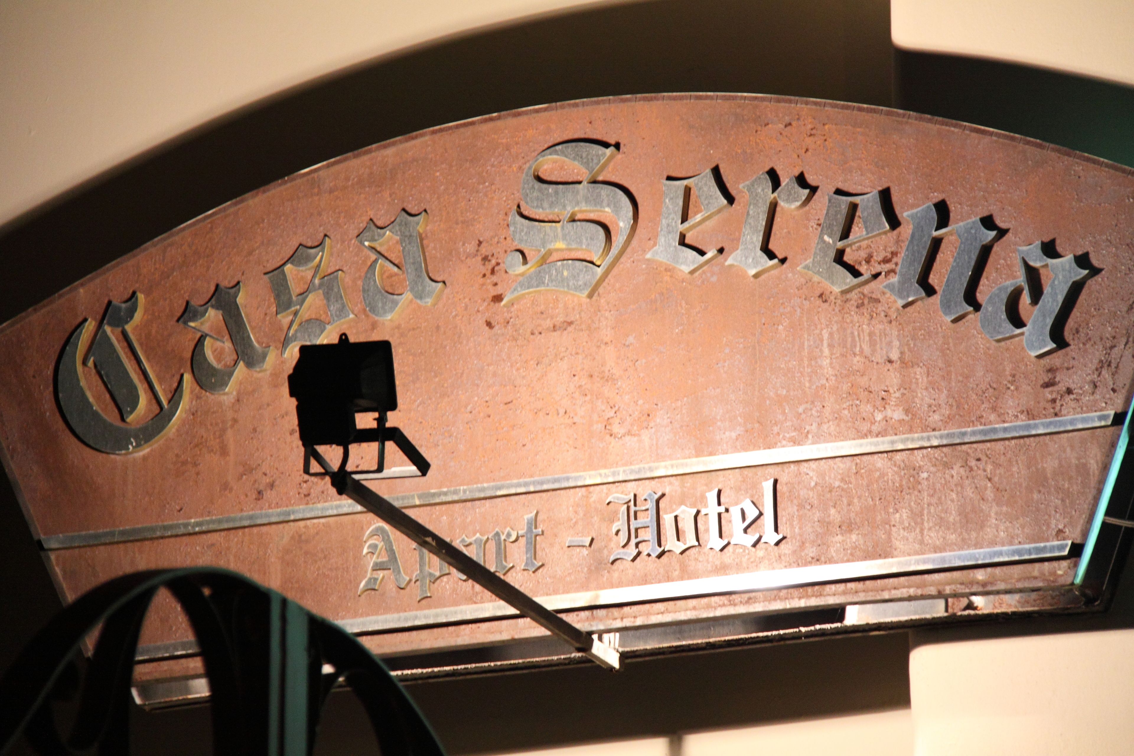 A sign for Casa Serena, an art hotel.