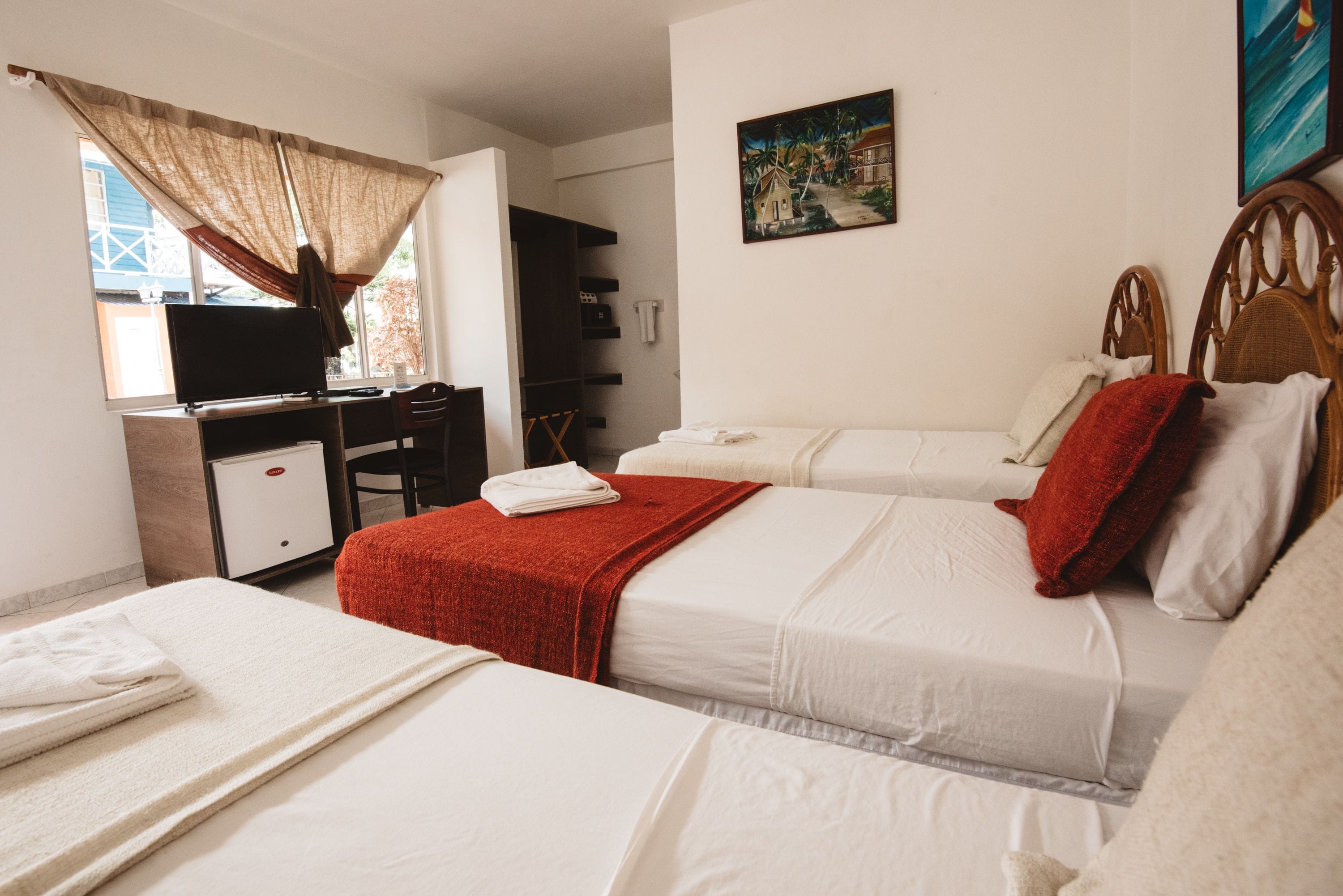 triple room, 3 single beds, partial ocean view | view from room