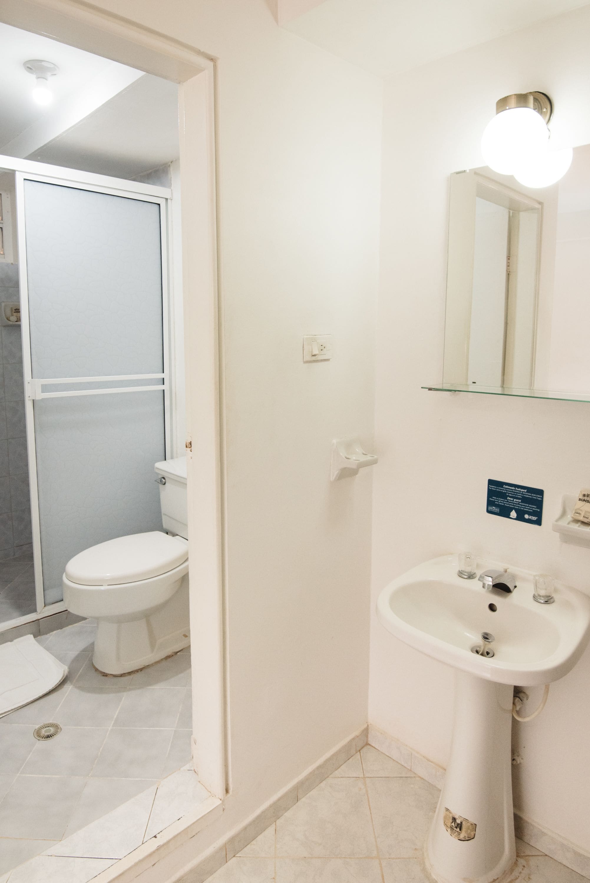 twin room, 2 single beds, partial ocean view | bathroom | shower, hair dryer, towels