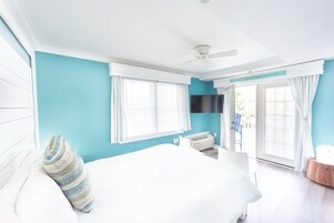 Premium bedding, down duvets, blackout curtains, iron/ironing board