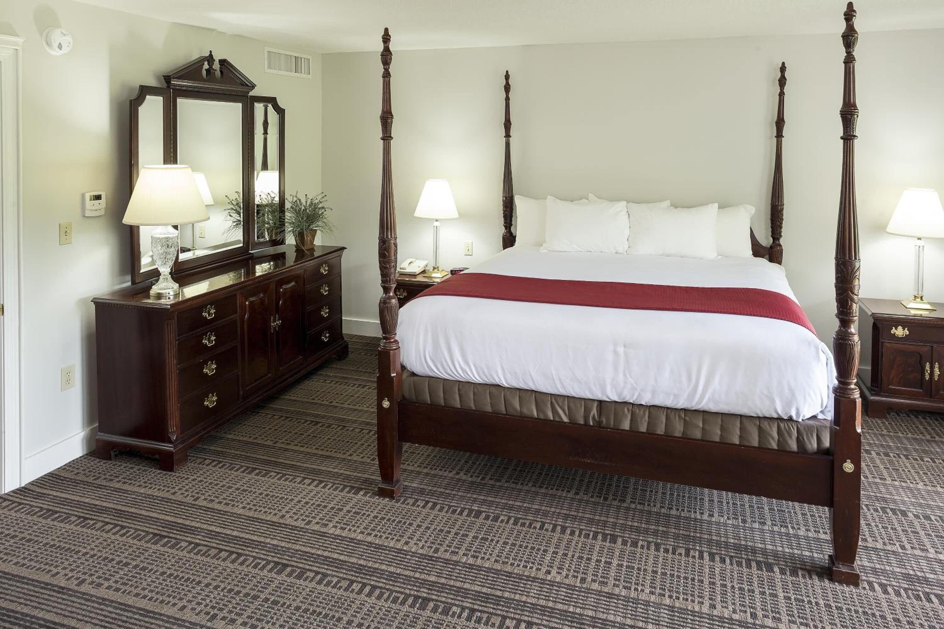 Desk, laptop workspace, blackout drapes, iron/ironing board