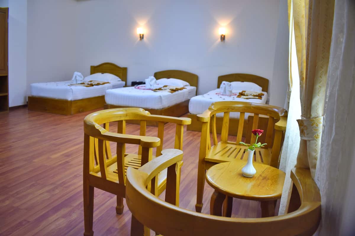 family suite, 3 single beds, city view, poolside | minibar, desk, blackout curtains, soundproofing