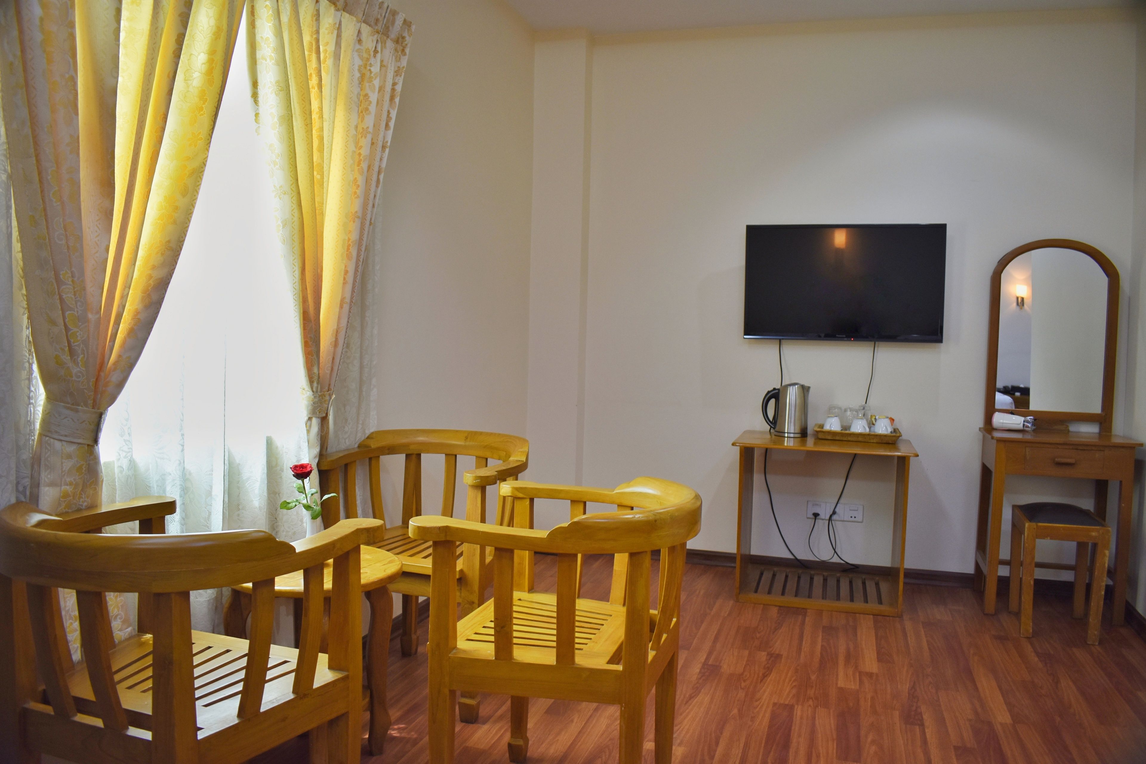 family suite, 3 single beds, city view, poolside | minibar, desk, blackout curtains, soundproofing