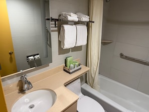 Room, 1 King Bed, Non Smoking | Bathroom | Shower, free toiletries, hair dryer, towels