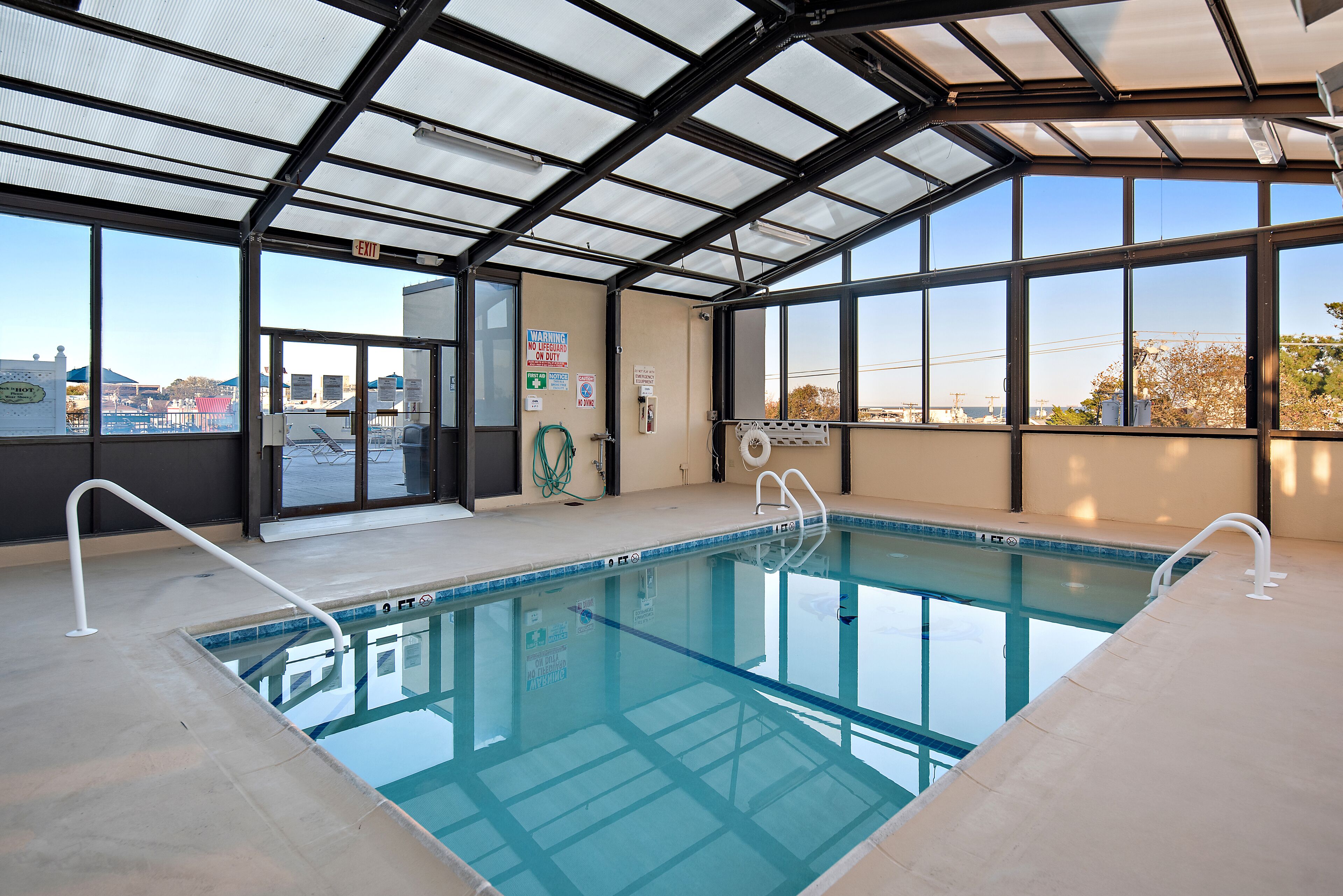 indoor pool, open 8:30 am to 10:00 pm, pool loungers