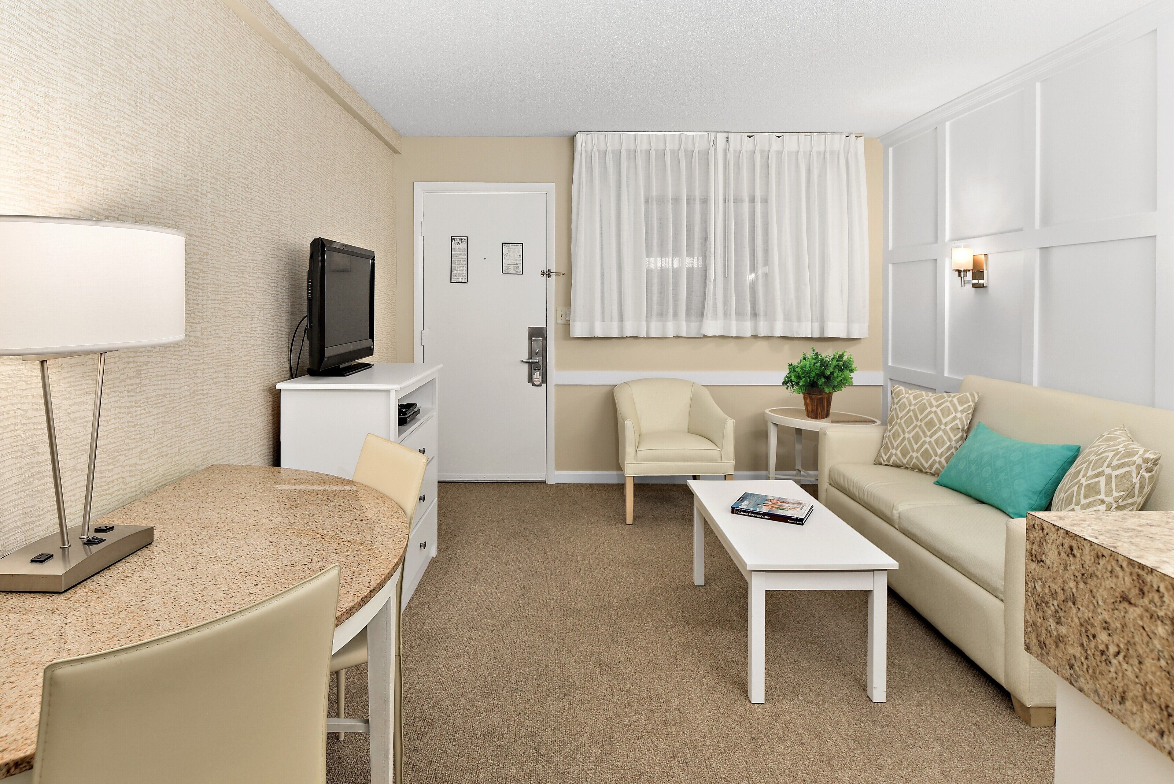 suite, 2 double beds | living room | 50-inch smart tv with cable channels, tv, streaming services