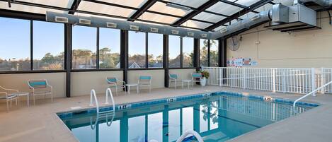 Indoor pool, open 8:30 AM to 10:00 PM, pool loungers