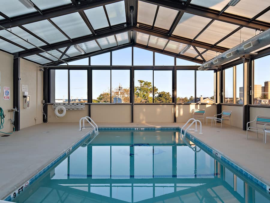 Indoor pool, open 8:30 AM to 10:00 PM, pool loungers