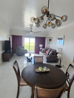 55-inch flat-screen TV with satellite channels, TV, computer - Harbor Breeze Villas (Clarence Town)