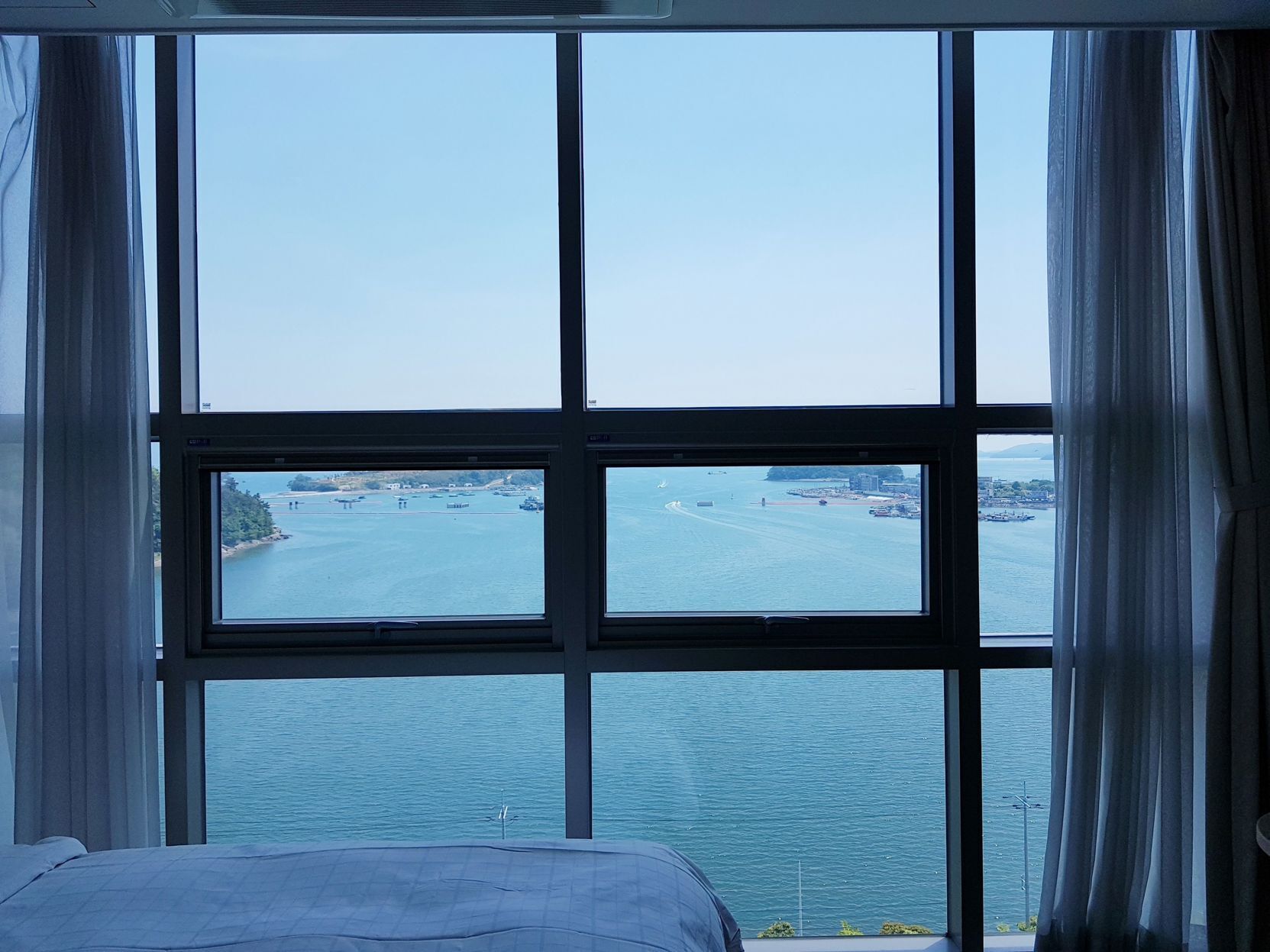 Desk, laptop workspace, blackout curtains, soundproofing