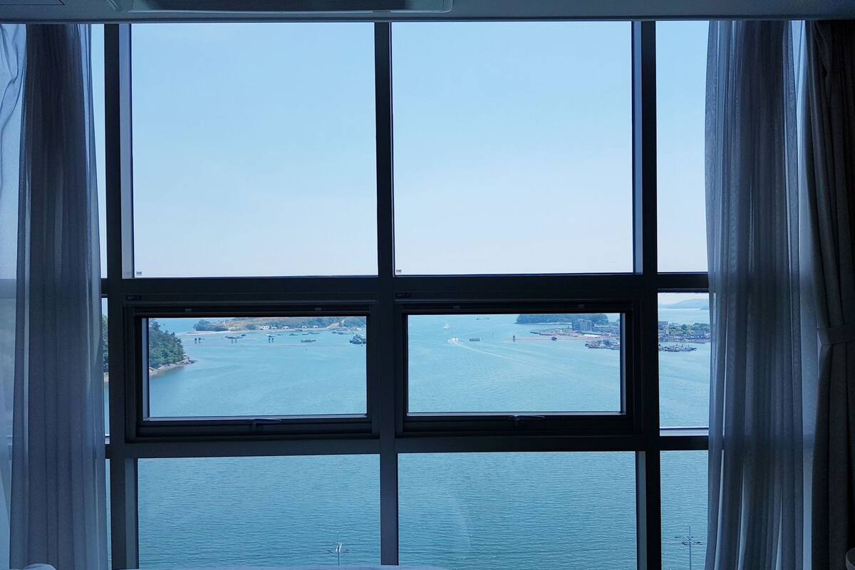 Desk, laptop workspace, blackout curtains, soundproofing