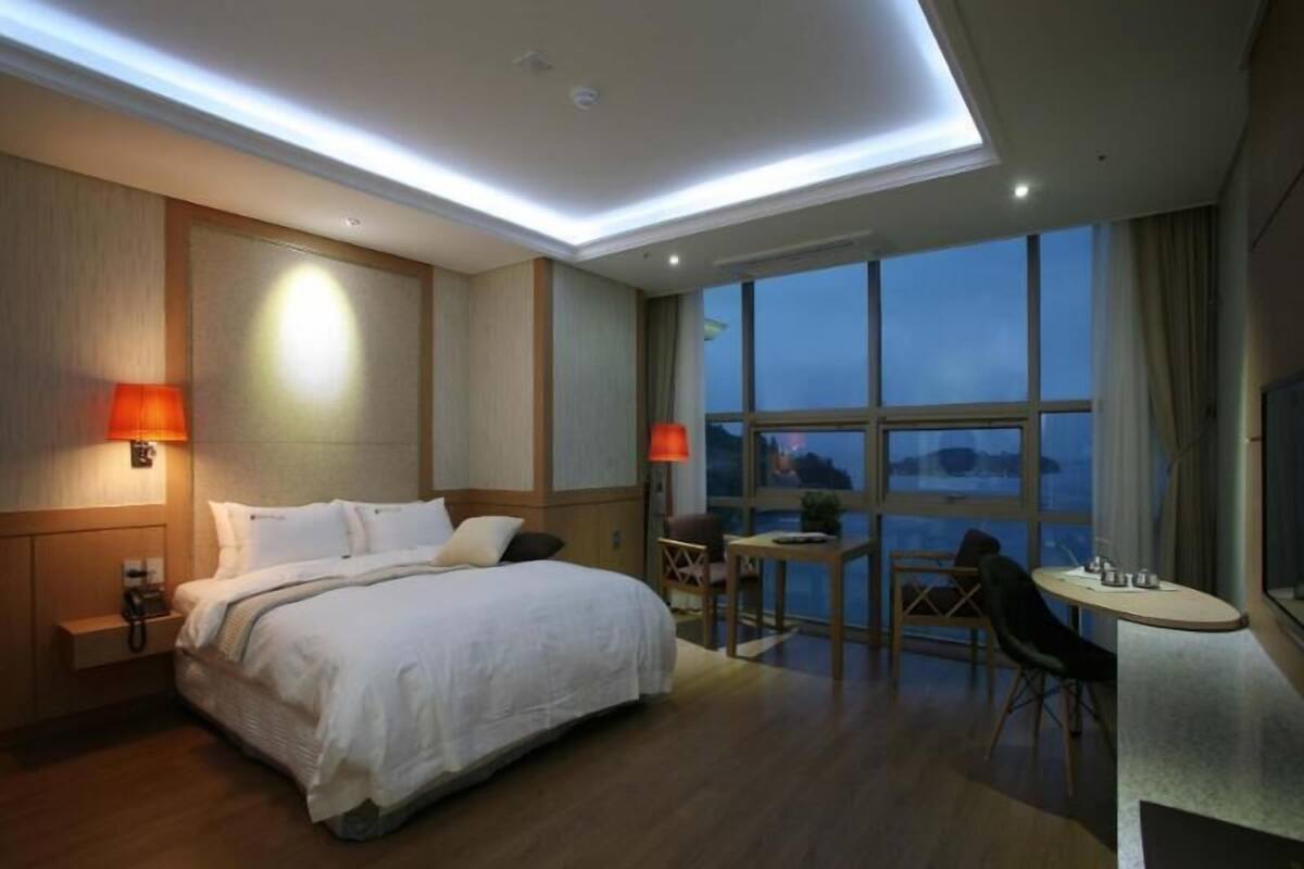 Desk, laptop workspace, blackout curtains, soundproofing