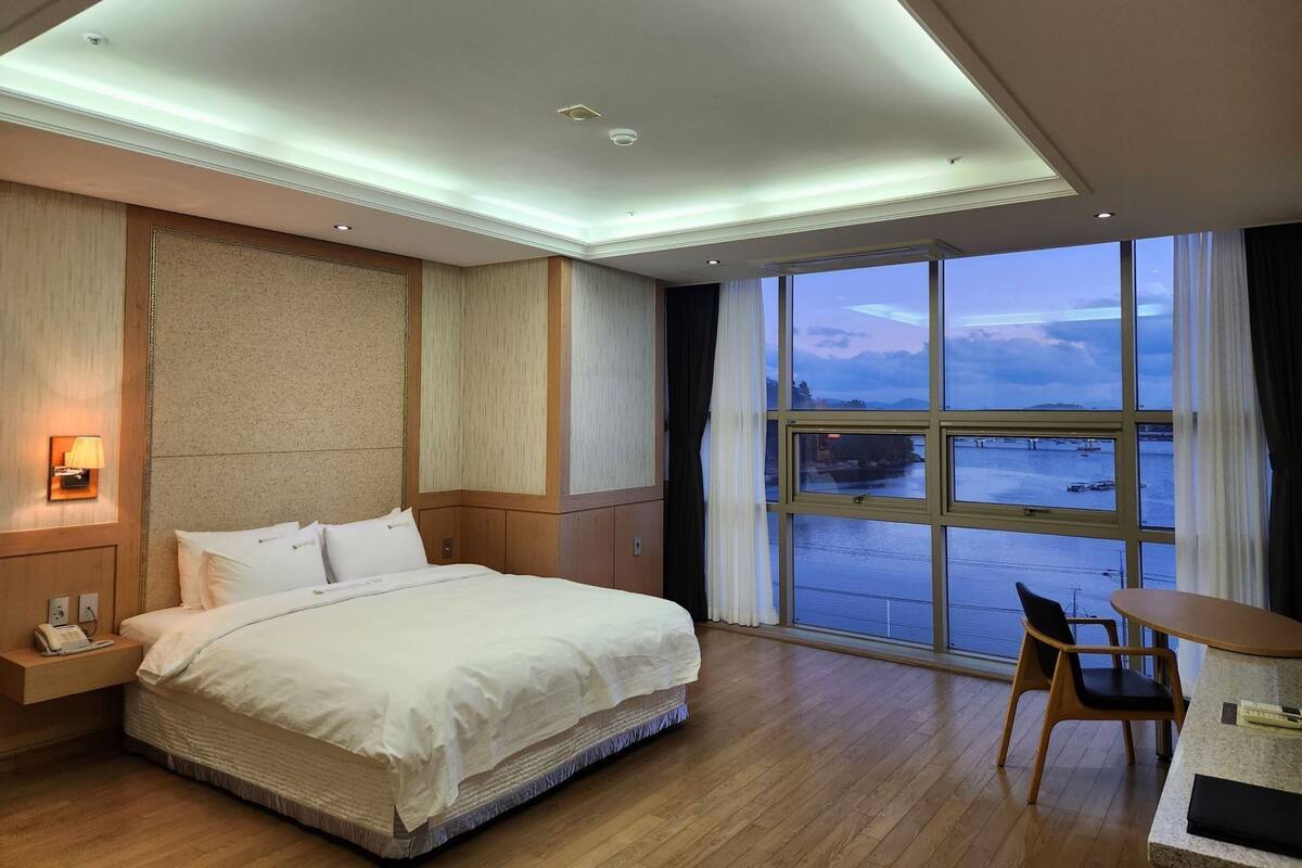 Desk, laptop workspace, blackout curtains, soundproofing