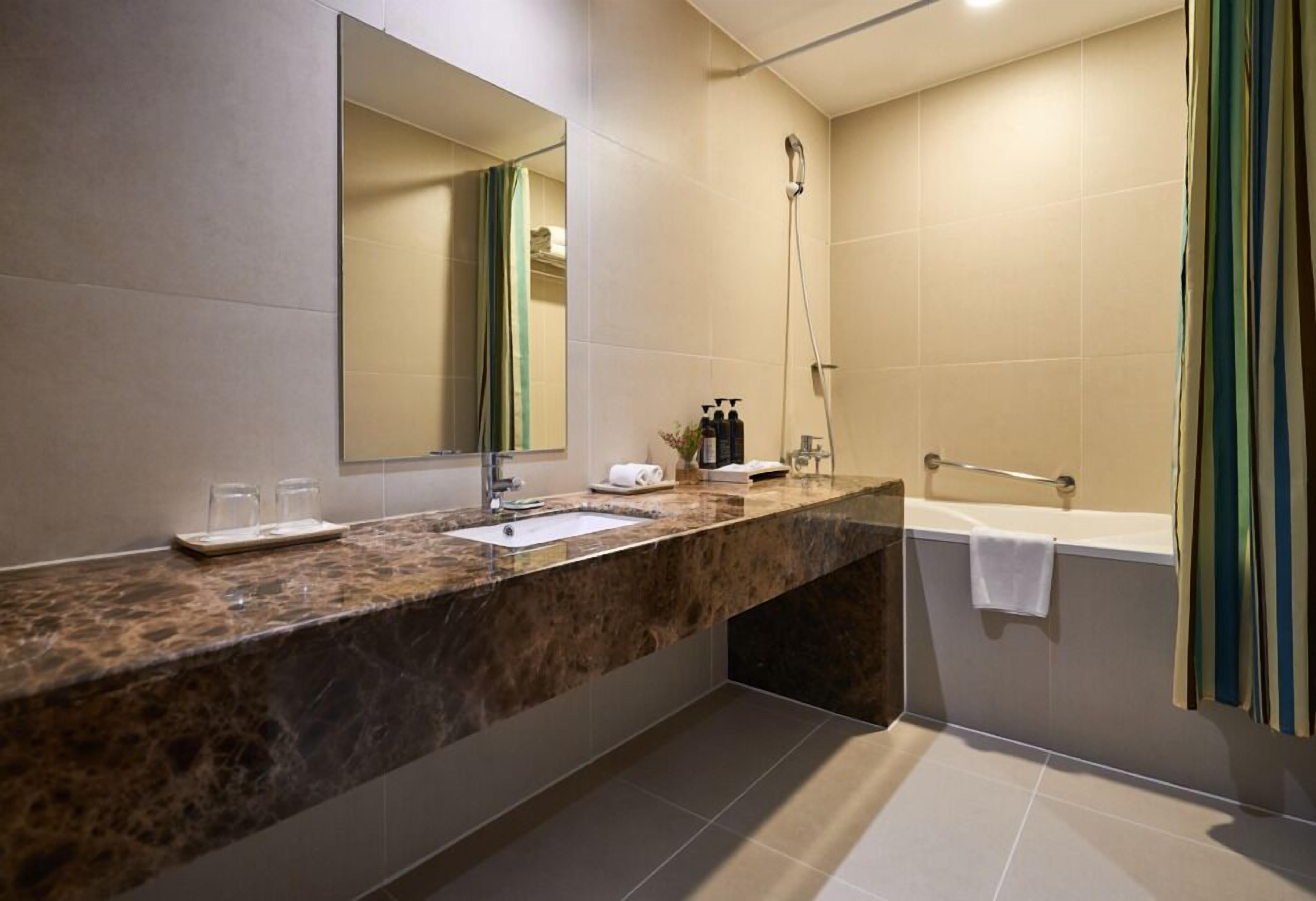 shower, hair dryer, slippers, bidet