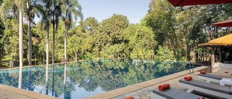 Outdoor pool, pool umbrellas, sun loungers