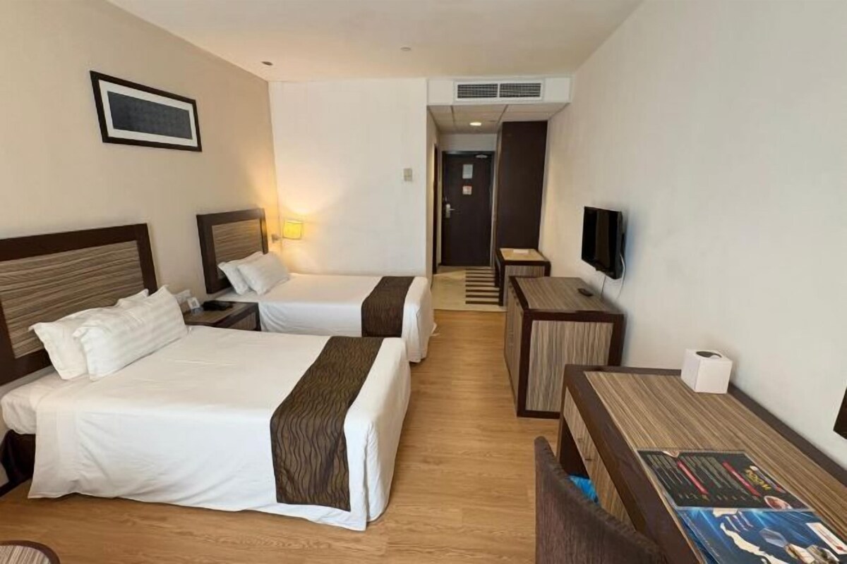 Minibar, desk, blackout curtains, iron/ironing board