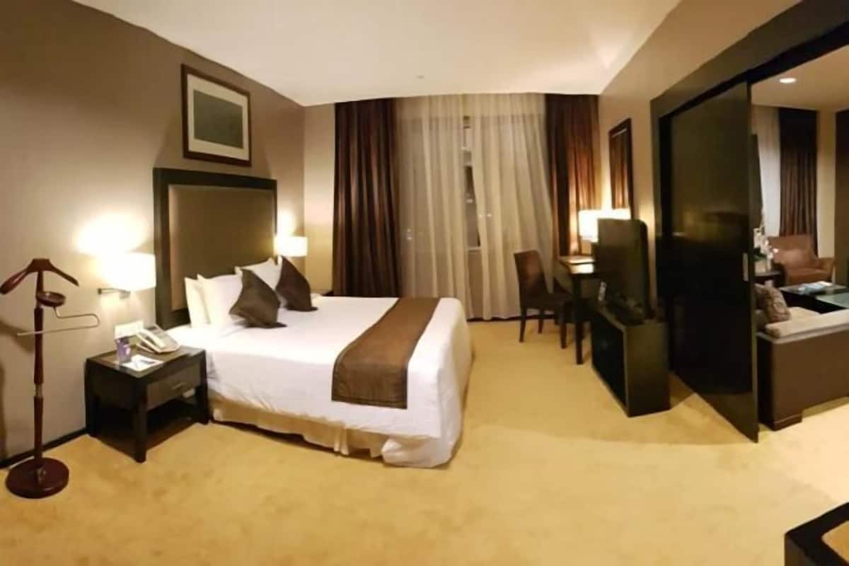 Minibar, desk, blackout drapes, iron/ironing board