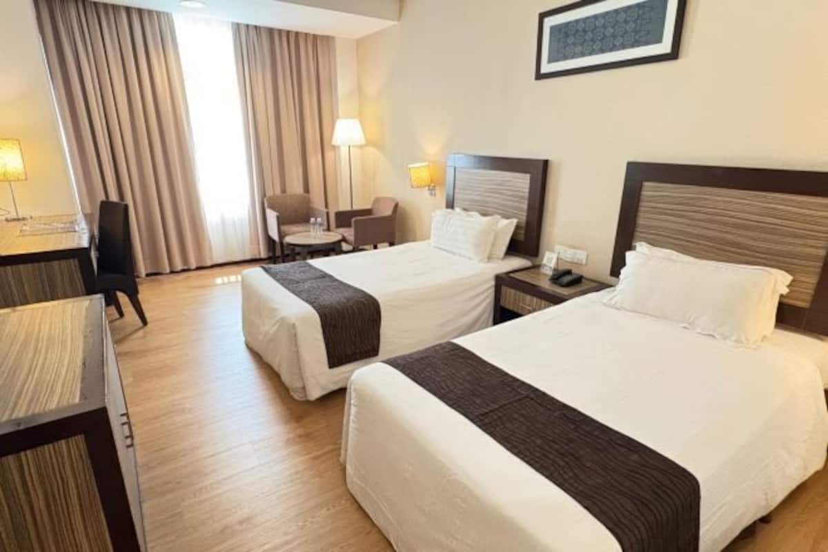 Minibar, desk, blackout drapes, iron/ironing board