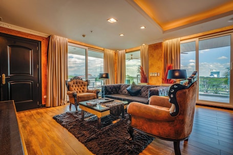 2 Bedroom Executive Suite w/ West Balcony | Living area | 42-inch Smart TV with cable channels, Netflix, streaming services. Fields Plaza Hotel