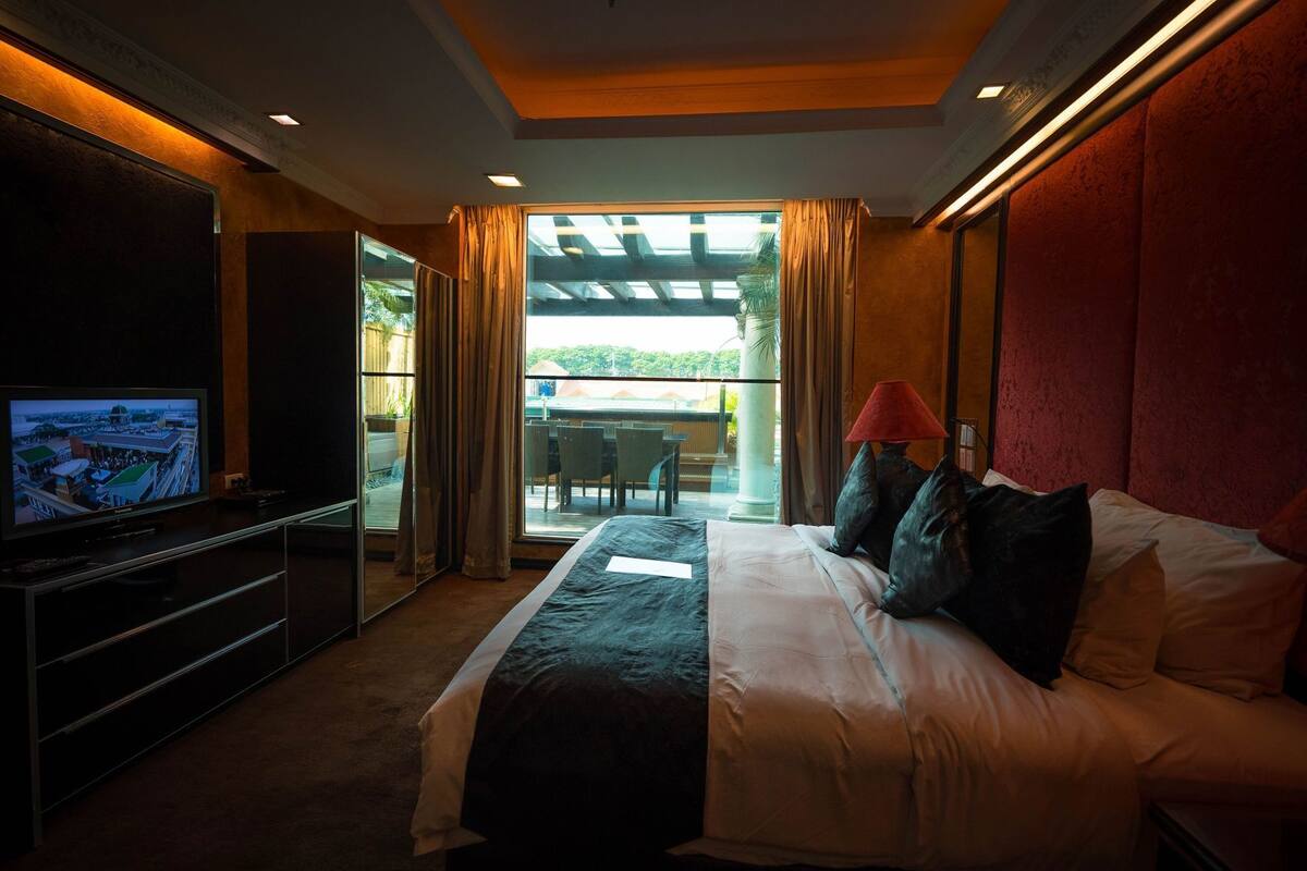 In-room safe, laptop workspace, blackout drapes, soundproofing