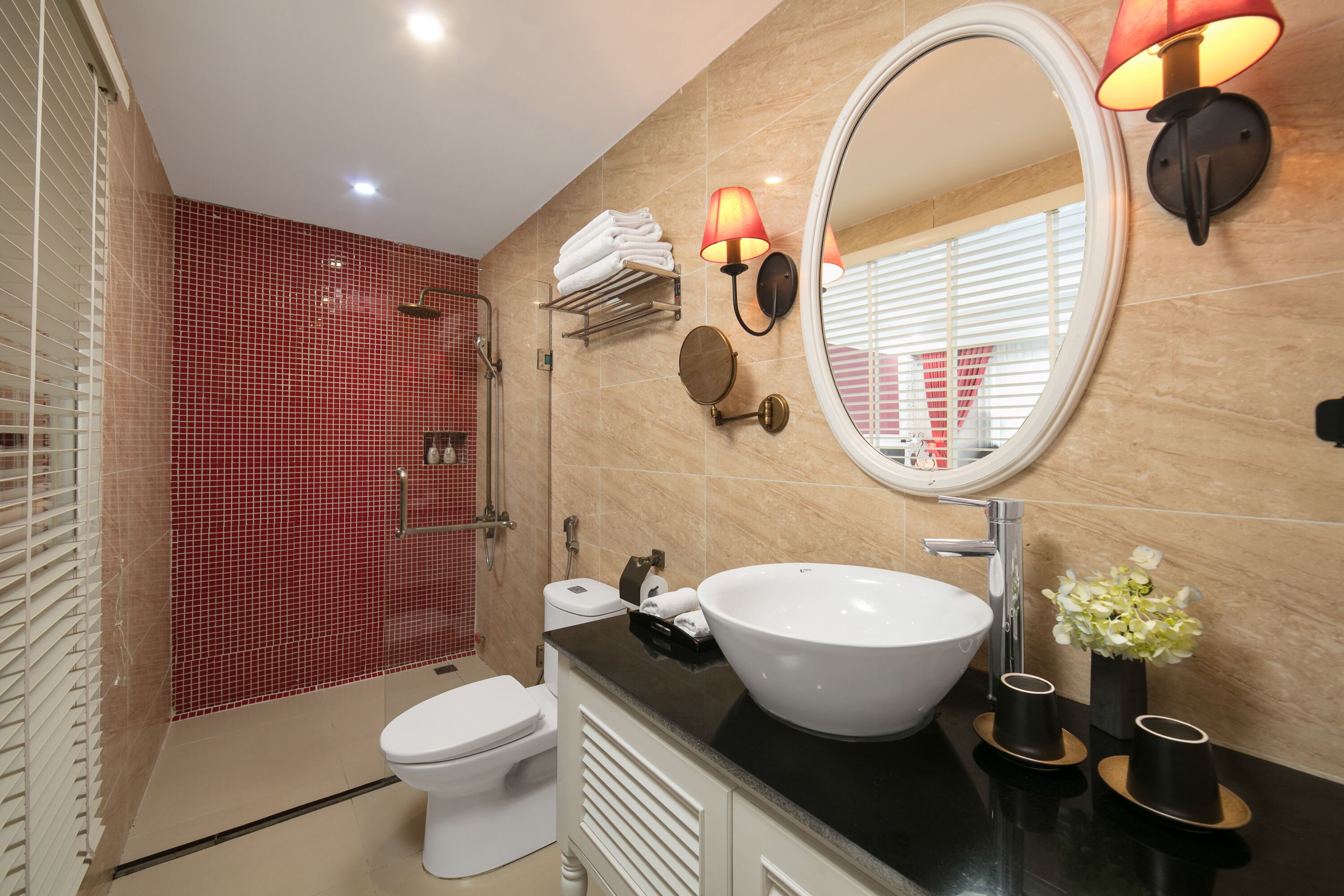 family executive suite, 1 king bed, 1 single bed with sofa bed, city view  | bathroom | shower, free toiletries, hair dryer, slippers