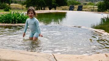 2 outdoor pools, a natural pool, open 7:00 AM to 4:00 PM, sun loungers