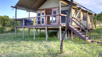 Guests can enjoy a peaceful retreat in this secluded lodge with a deck and easy access to the entrance.