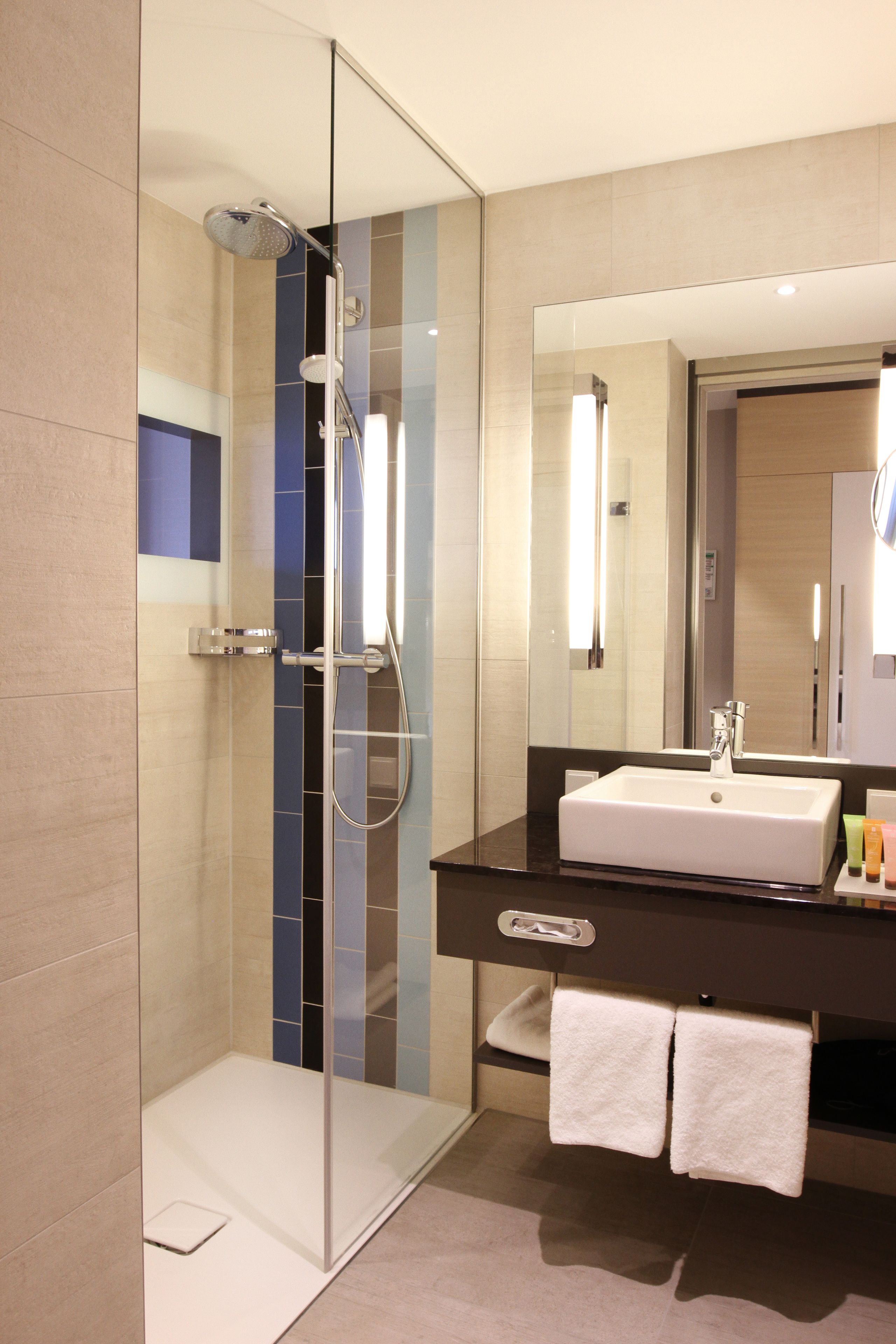 shower, eco-friendly toiletries, hair dryer, towels