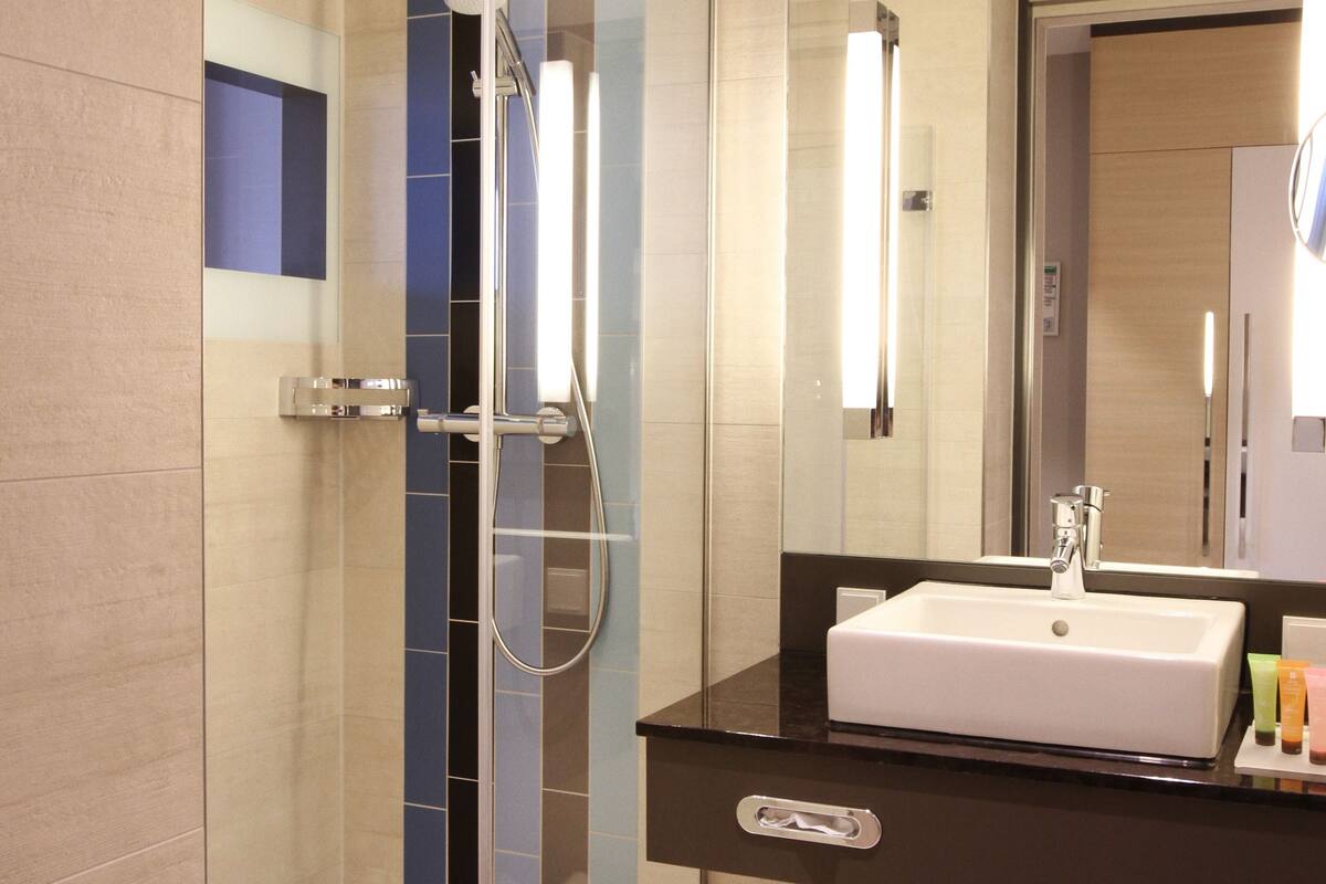 shower, eco-friendly toiletries, hair dryer, towels